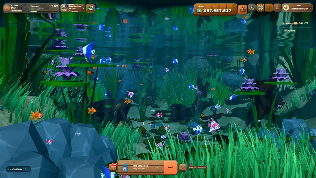 Fish swimming among coral and plants in a tropical habitat at night